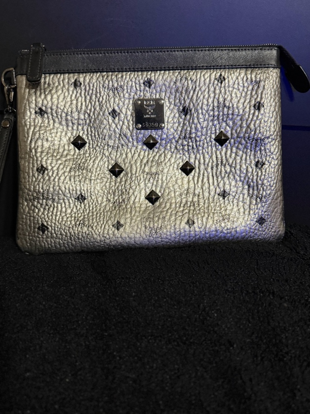 MCM Metallic Silver Studded Leather Clutch with Black Trim